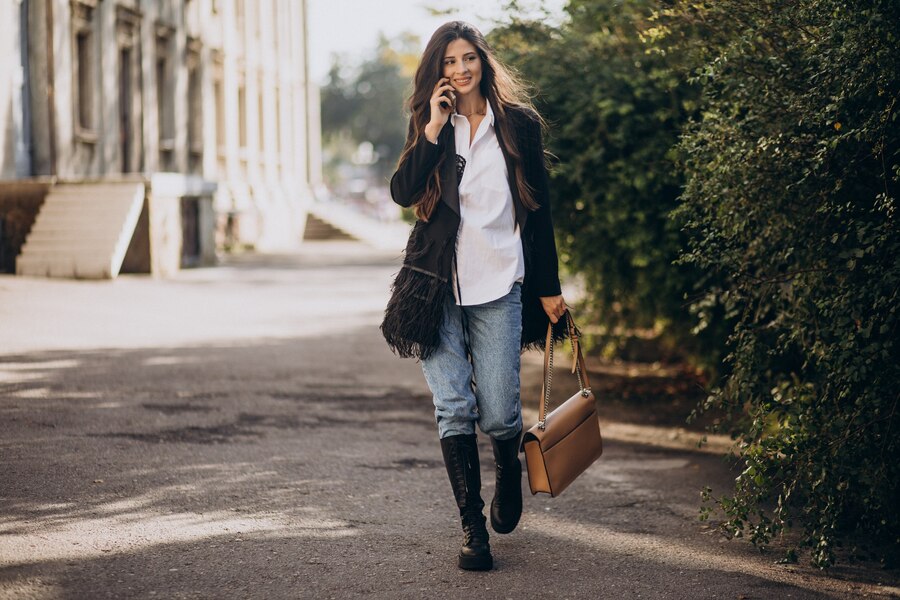 Pair of brown chunky boots with lace-up detailing